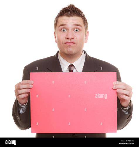 Funny business man holding sign red blank Stock Photo - Alamy