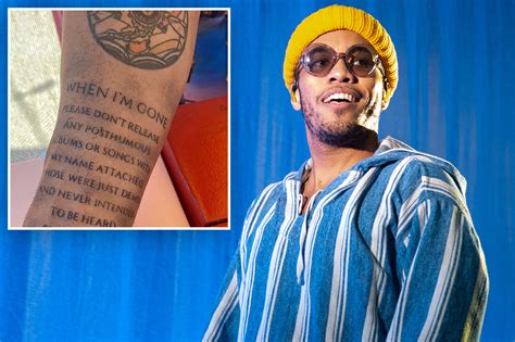 Anderson .Paak gets tat warning people not to release his music ...