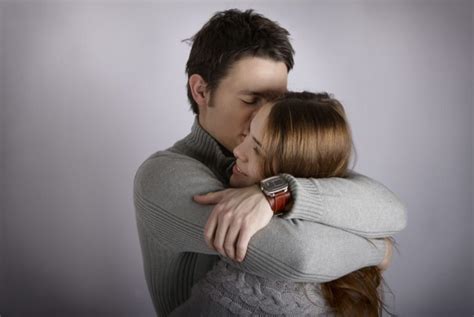 What does it mean when a guy initiates a hug? | Body Language Central