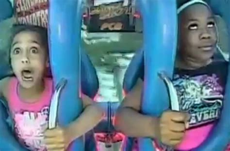 Two girls freak out on slingshot ride