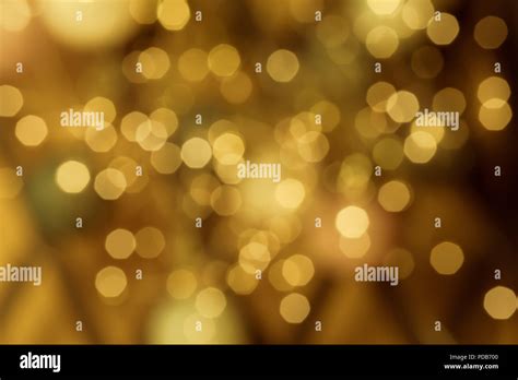 Bright round hexagonal on vivid champagne color background Stock Photo - Alamy