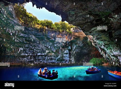 Boat ride in "cave-lake" of Melissani, in Kefalonia island, Ionian sea ...