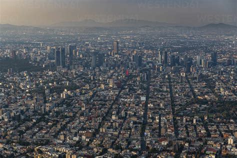 Mexico, Mexico City, Aerial view of densely populated city at dusk stock photo