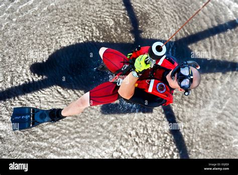 Coast guard rescue swimmer hi-res stock photography and images - Alamy