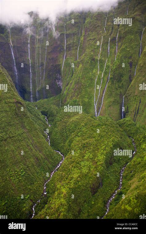 Aerial of waterfalls on Mt. Waialeale, Kauai, Hawaii. This spot is ...