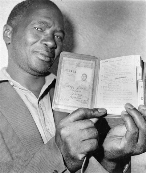 a man holding an open book in his hands