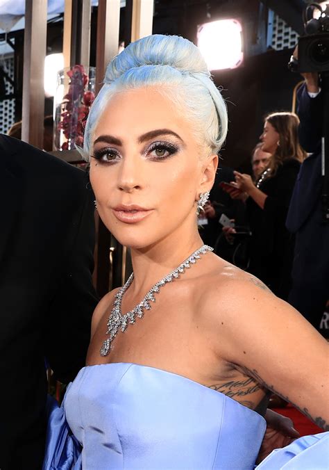 Lady Gaga Dyes Hair Blue to Match Dress for the 2019 Golden Globes | Allure