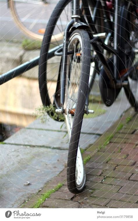 Detail of a broken bicycle with an 8 in the wheel at the roadside - a Royalty Free Stock Photo ...