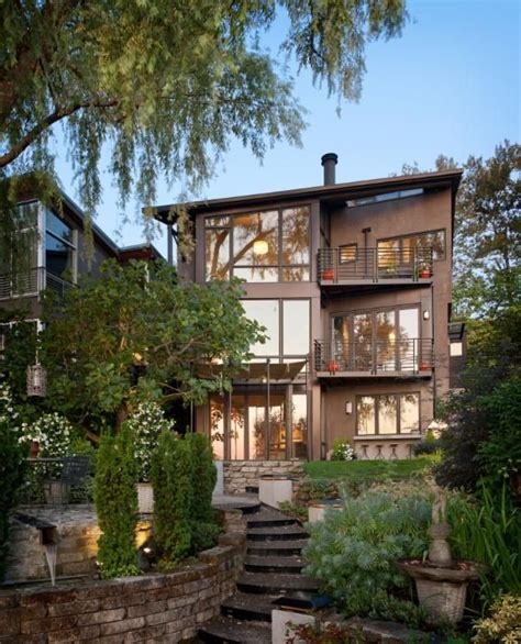 a large house with stairs leading up to it