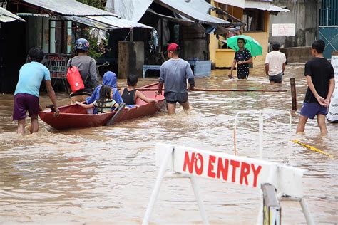 Death toll from Philippine landslides, floods climbs