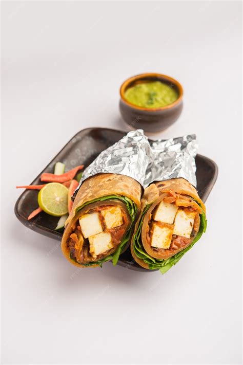 Premium Photo | Cottage Cheese Paneer kathi roll or wrap also known as ...