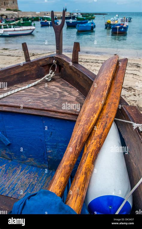 Typical colorful fishing boats in the south of Italy, Apulia region Stock Photo - Alamy