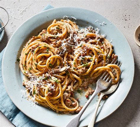 Bucatini with mushrooms & sausage recipe | BBC Good Food