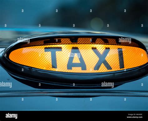 London Taxi Black Cab Illuminated Sign, London UK Stock Photo - Alamy