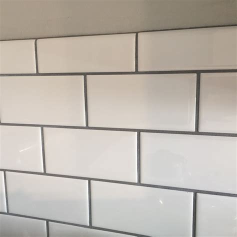 white subway tile backsplash with dark gray grout – Teal Inspiration