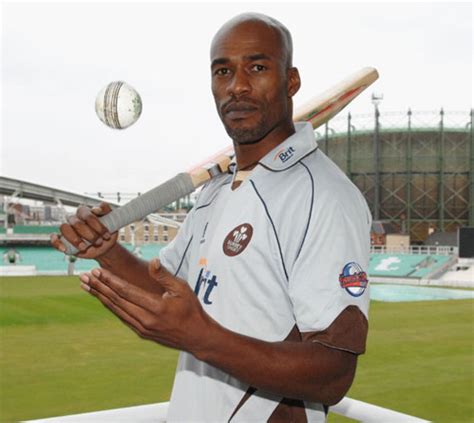 Chris Lewis poses after re-signing with Surrey | ESPNcricinfo.com