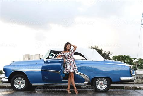 Beautiful woman driving a retro convertible car 16250367 Stock Photo at ...