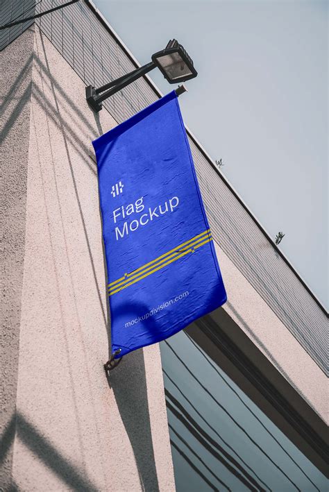 Free Vertical Flag on Building Mockup (PSD)