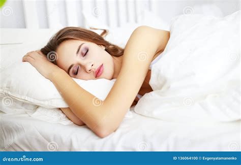 Beautiful Young Woman Sleeping in Bed in the Morning Stock Photo ...