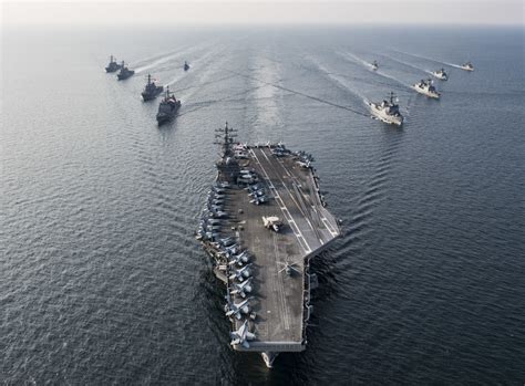 These pictures featuring USS Ronald Reagan Carrier Strike Group sailing ...