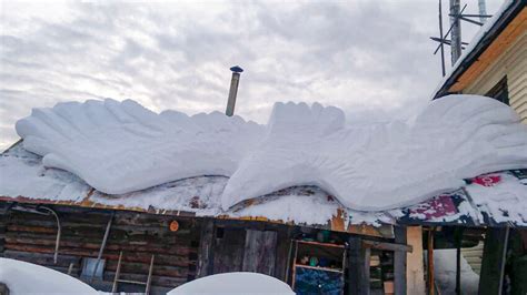 Rooftop snow sculptures created by a savvy resident of the Urals ...