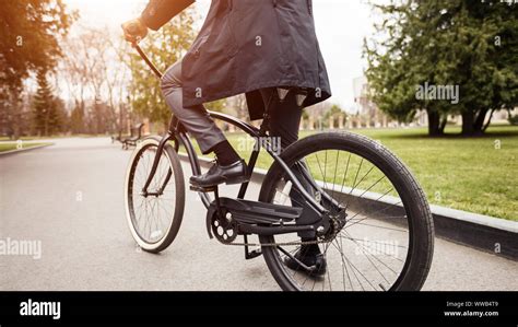 Active man going to work by bike, crop Stock Photo - Alamy