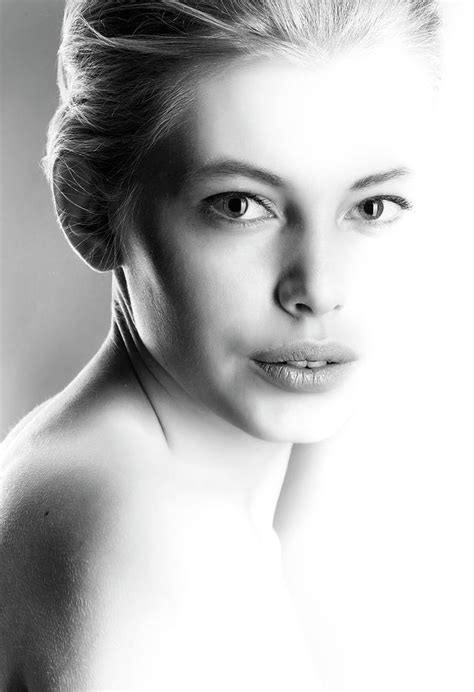 High contrast black and white portrait of a beautiful girl. Photograph by Vladimir Larionov ...