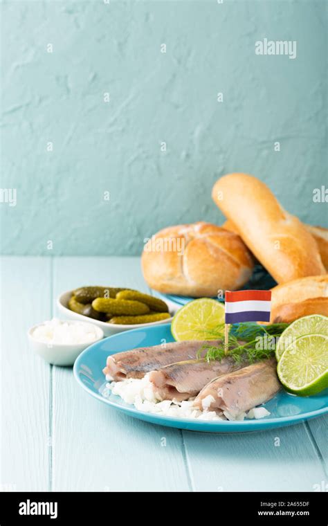 Traditional dutch food herring fish Stock Photo - Alamy