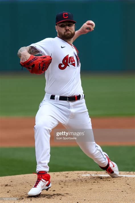 Cleveland Indians starting pitcher Logan Allen delivers a pitch to... | Cleveland indians ...