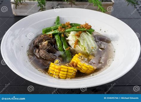 Beef Bulalo, a Popular a Beef Soup Dish from the Philippines. it is a Light Colored Soup with ...