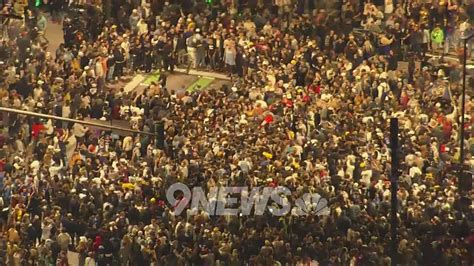 Raw: Fans crowd downtown Denver after Nuggets win | 9news.com