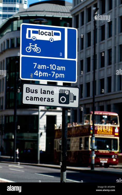 london bus lane signs Stock Photo - Alamy