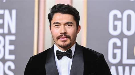 Henry Golding shuts down rumors that he is in the running to be James Bond