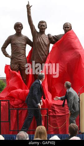 Statues of Sir Bobby Charlton, George Best and Denis Law statue at ...