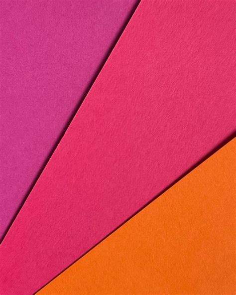 an assortment of different colored paper sheets