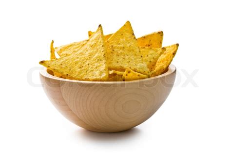 The nachos chips in bowl on white ... | Stock image | Colourbox