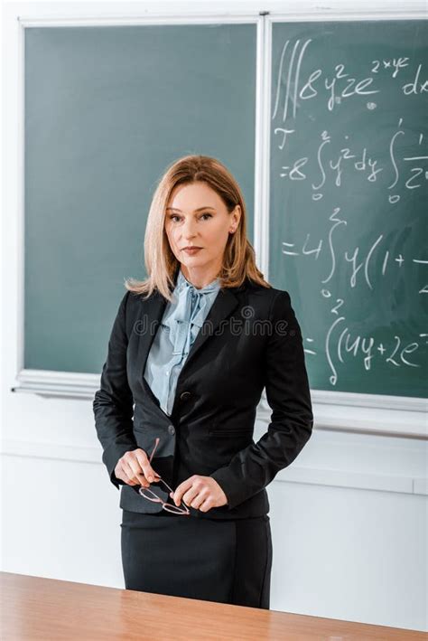 Beautiful Teacher Standing in Classroom and Stock Photo - Image of learning, knowledge: 155808802