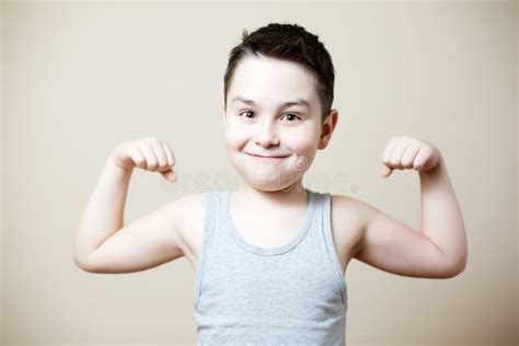 Little Boy Flexing Biceps Stock Photos - Free & Royalty-Free Stock Photos from Dreamstime