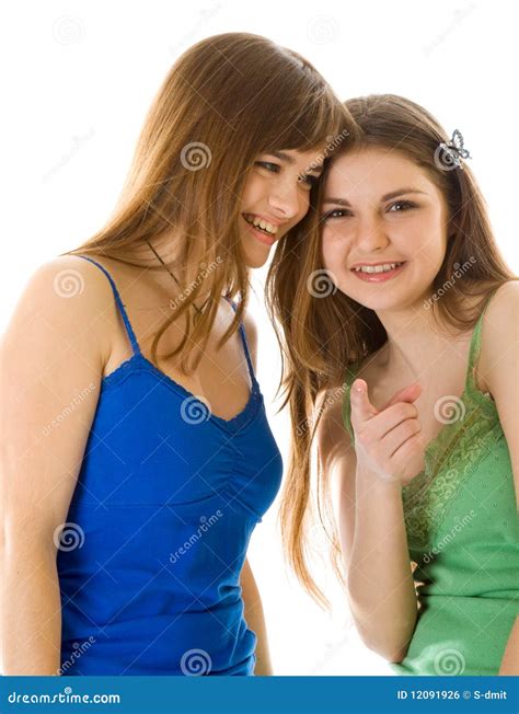 Two laugh teenage girls stock photo. Image of isolated - 12091926