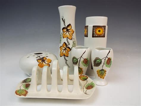 E Radford hand painted pottery vases etc.