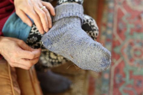 Darning Socks. Celebrating Differences - Bedlam Farm