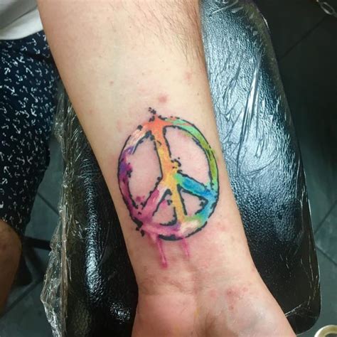 55+ Best Peace Sign Tattoo Designs - Anti-War Movement Symbol (2019)