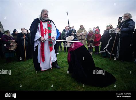 People take part in the winter solstice celebrations at the Stonehenge ...