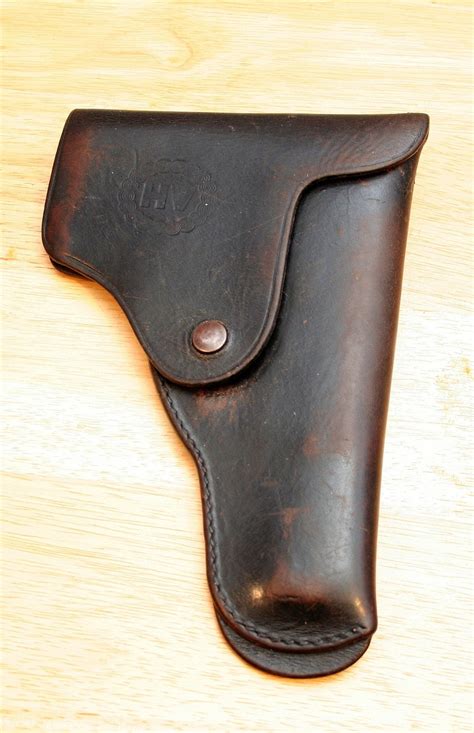 HV marked Holster for Egyptian Helwan/Danshway pistol? | Gunboards Forums