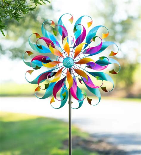 This Rainbow Colored Metal Wind Spinner is literally a 3-ring circus of ...