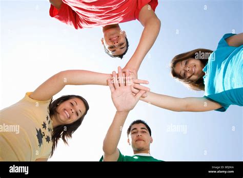 High School Students Touching Hands Stock Photo - Alamy