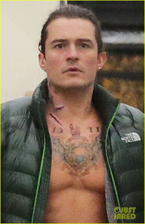 Orlando Bloom Gets Shirtless with Fake Tattoos for 'Unlocked': Photo ...