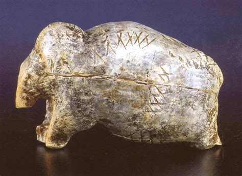 "Mammoth from Vogelherd cave", Swabia, Southwestern Germany. 33,000 BCE. 4 cm long mammoth ivory ...
