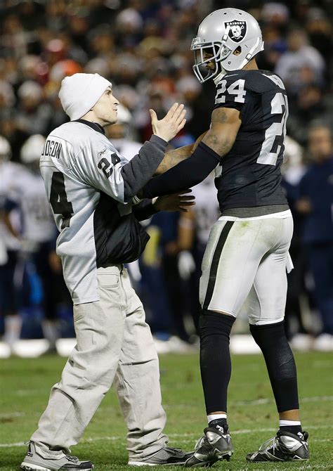 Charles Woodson - Photos: Chargers vs. Raiders - ESPN