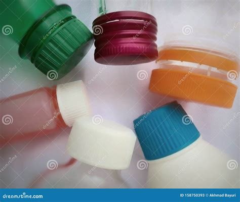 A Collection of Plastic Bottles and Caps with Various Shapes and Colors Stock Image - Image of ...